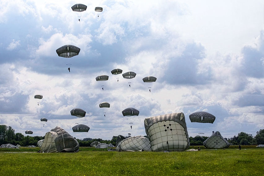 82nd Airborne Division Jump<br />
Paratroopers assigned to the 82nd Airborne Division conduct a parachute jump on Sicily Drop Zone, Fort Liberty, NC