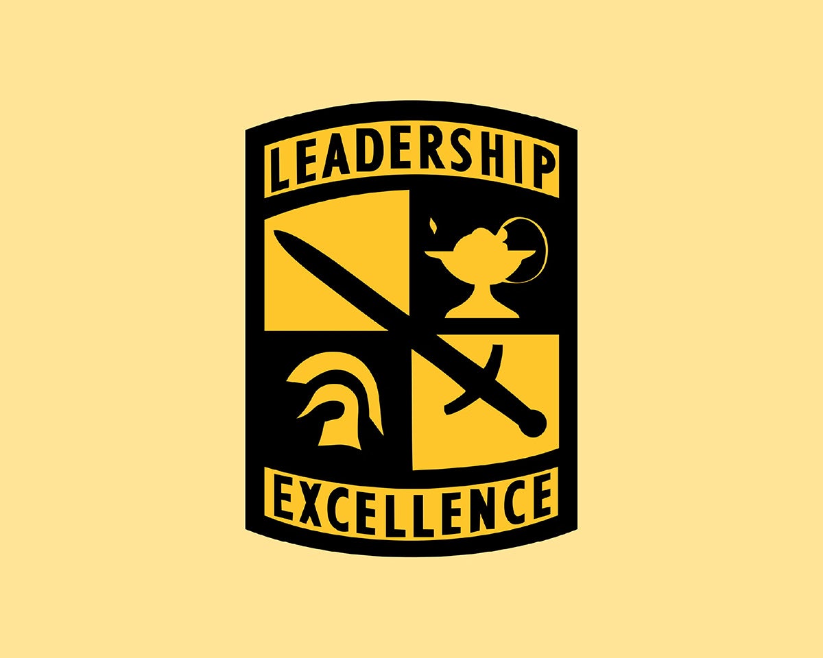 Army ROTC patch on yellow background